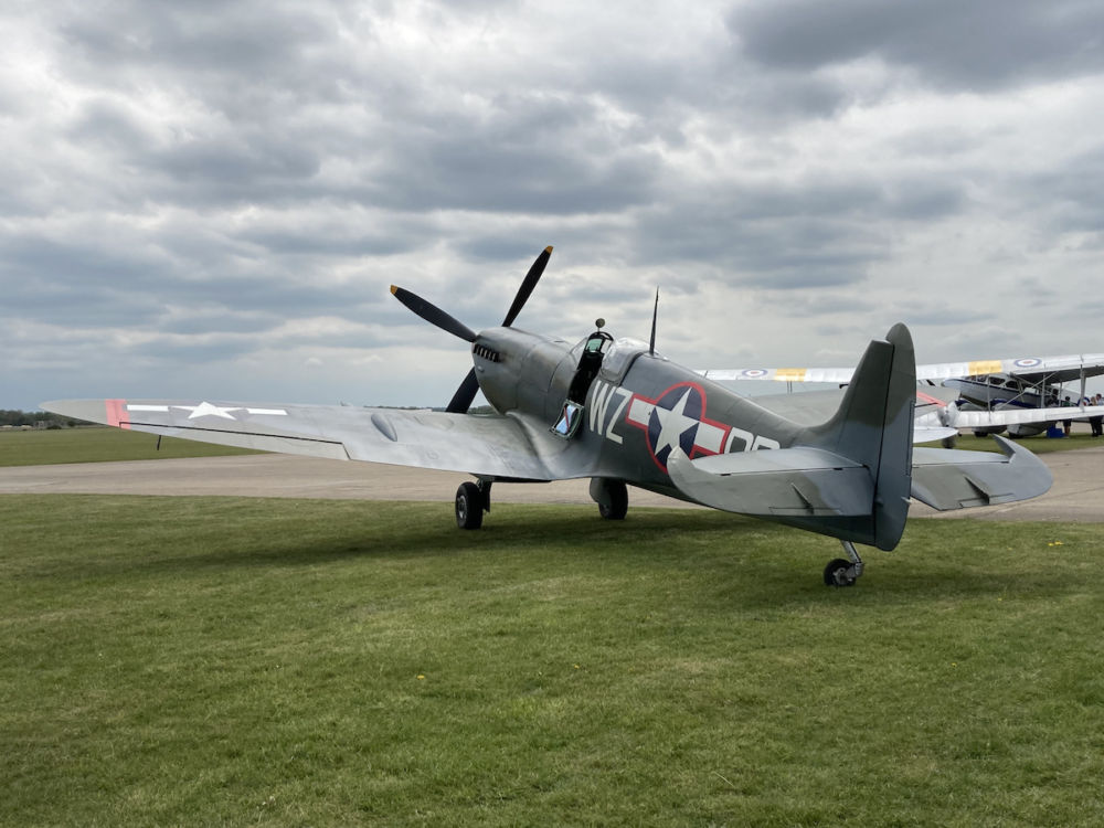 A Spitfire airplane displayed on the airfield of the Imperial War Museum Duxford