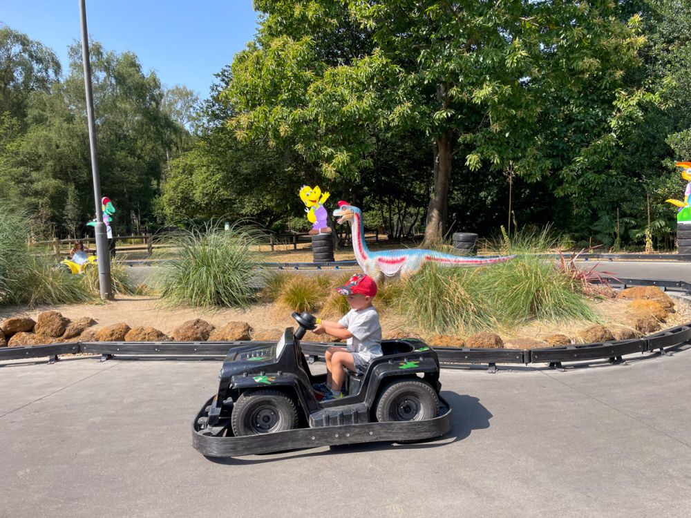 Ben Bertoni on a go-kart at the Roarr! dinosaur park track